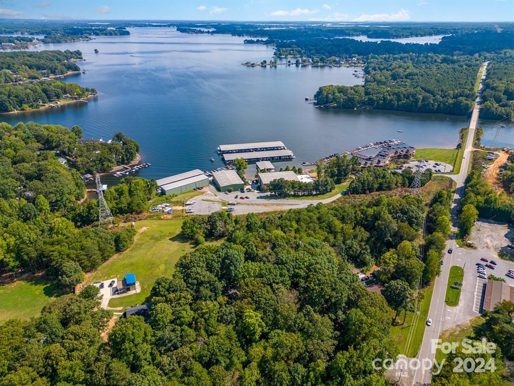 4516 Slanting Bridge Road Sherrills Ford, NC 28673 - Photo 7 of 18 an aerial view of a house with a lake view