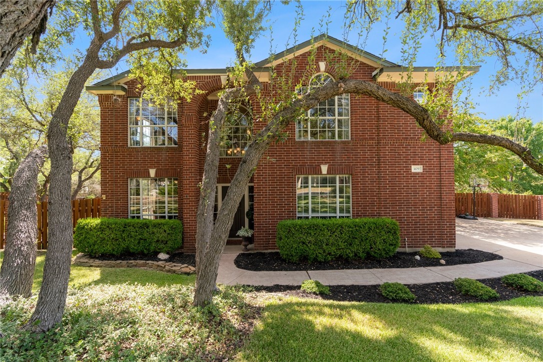 409 Explorer Lakeway, TX 78734 - Photo 1 of 1 a front view of a house with a yard
