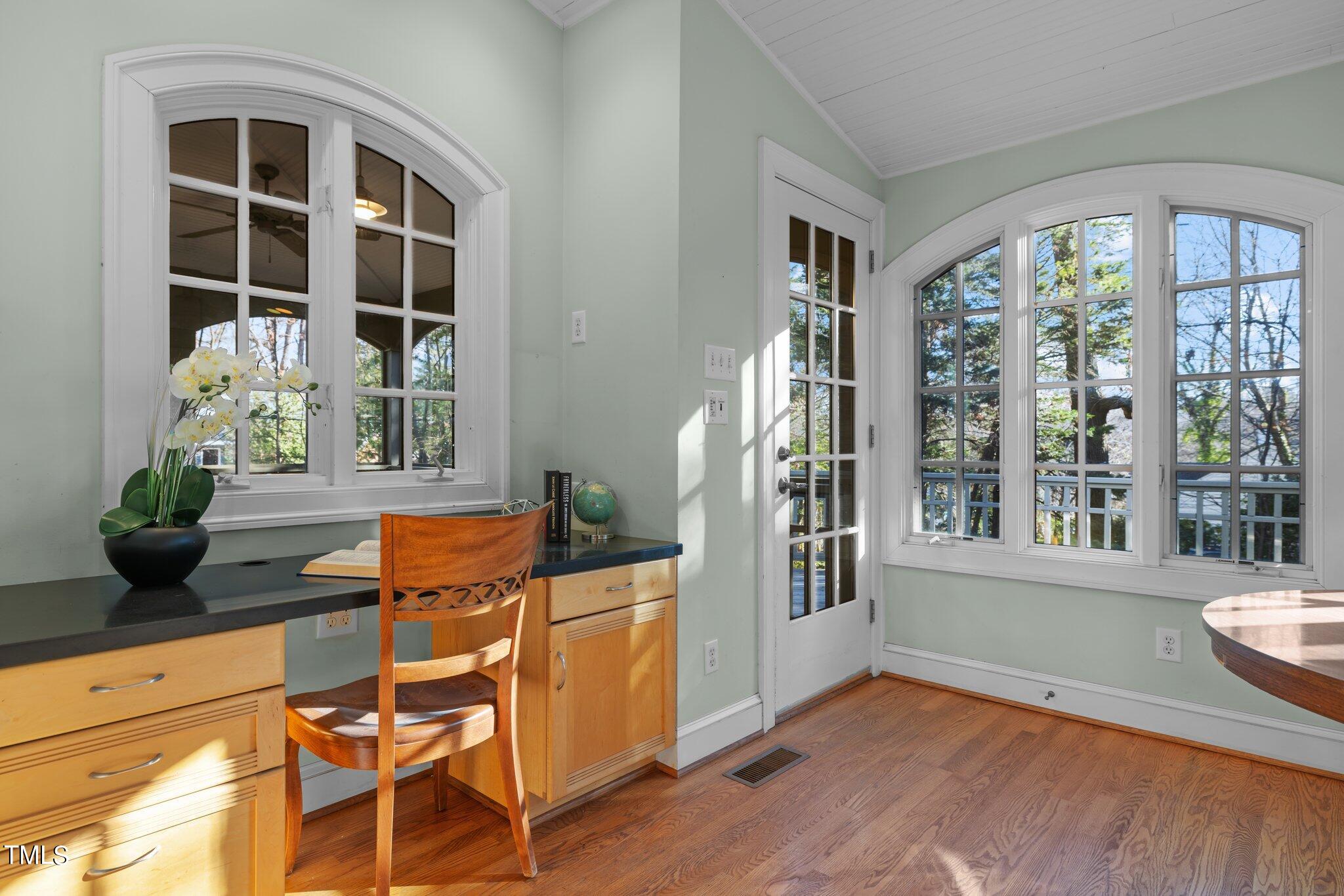 228 Furches Street Raleigh, NC 27607 - Photo 19 of 65 a view of a livingroom with furniture and an window