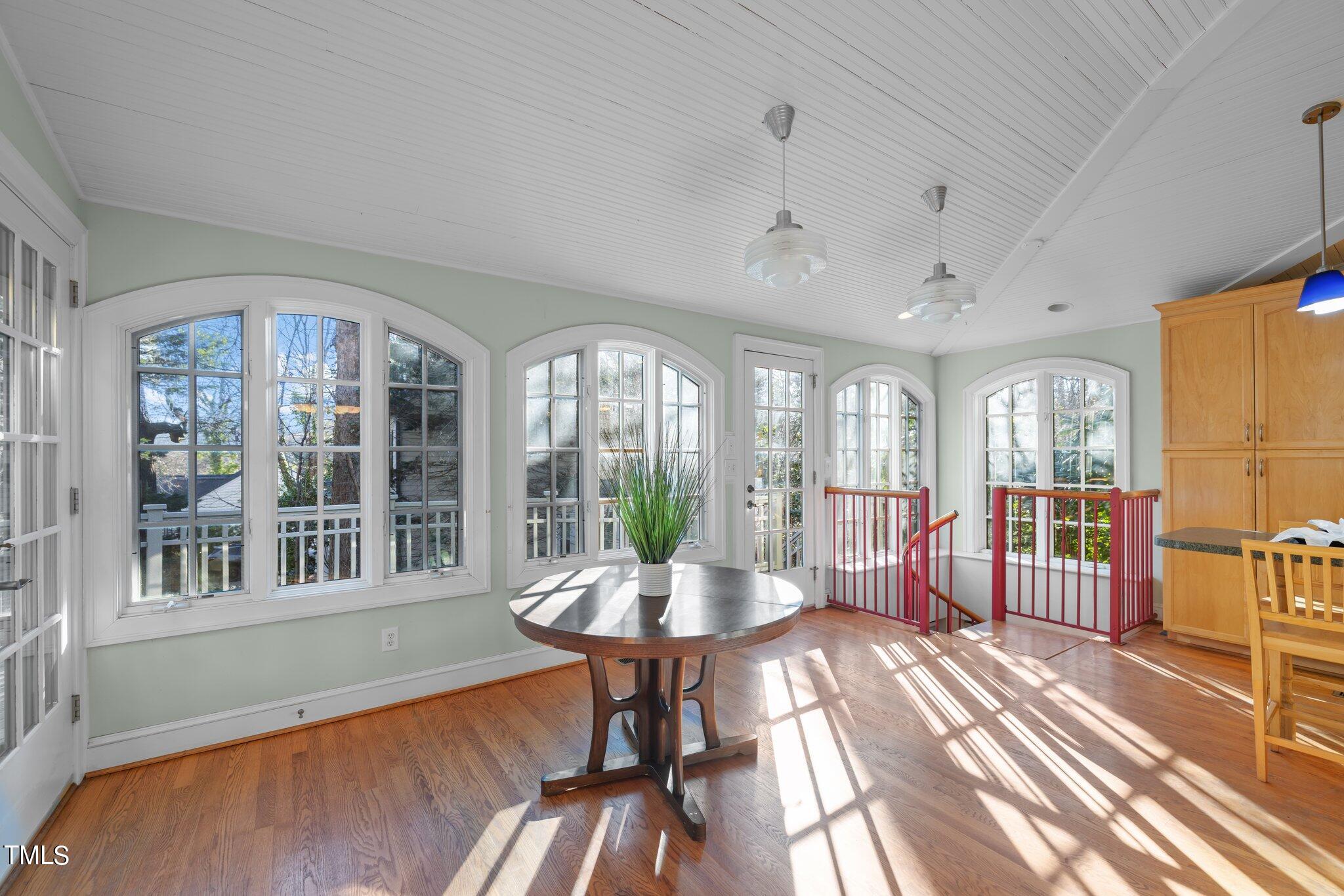 228 Furches Street Raleigh, NC 27607 - Photo 20 of 65 a living room with furniture and a large window