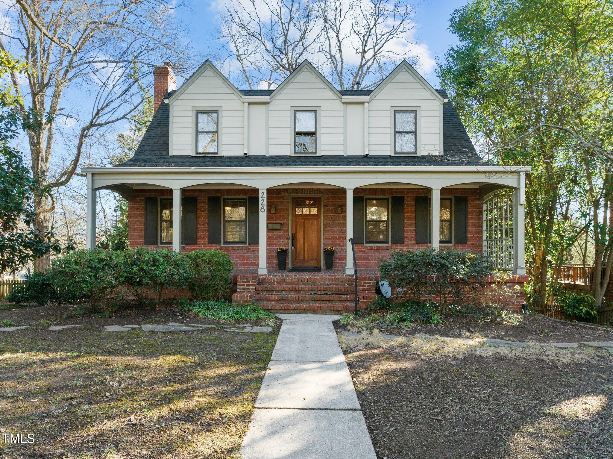 228 Furches Street Raleigh, NC 27607 - Photo 4 of 65 a front view of house with yard and green space
