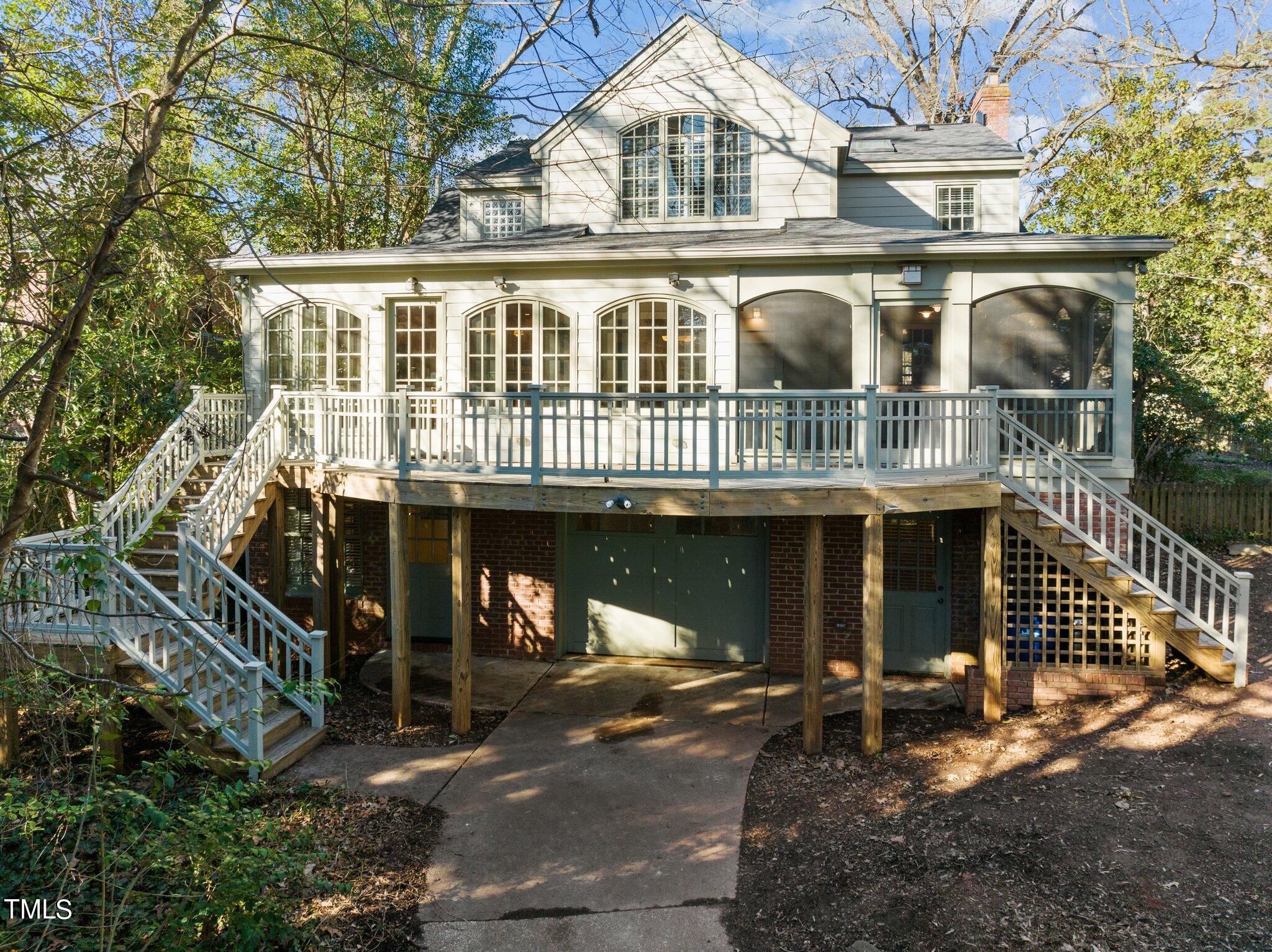 228 Furches Street Raleigh, NC 27607 - Photo 48 of 65 a front view of a house with a porch
