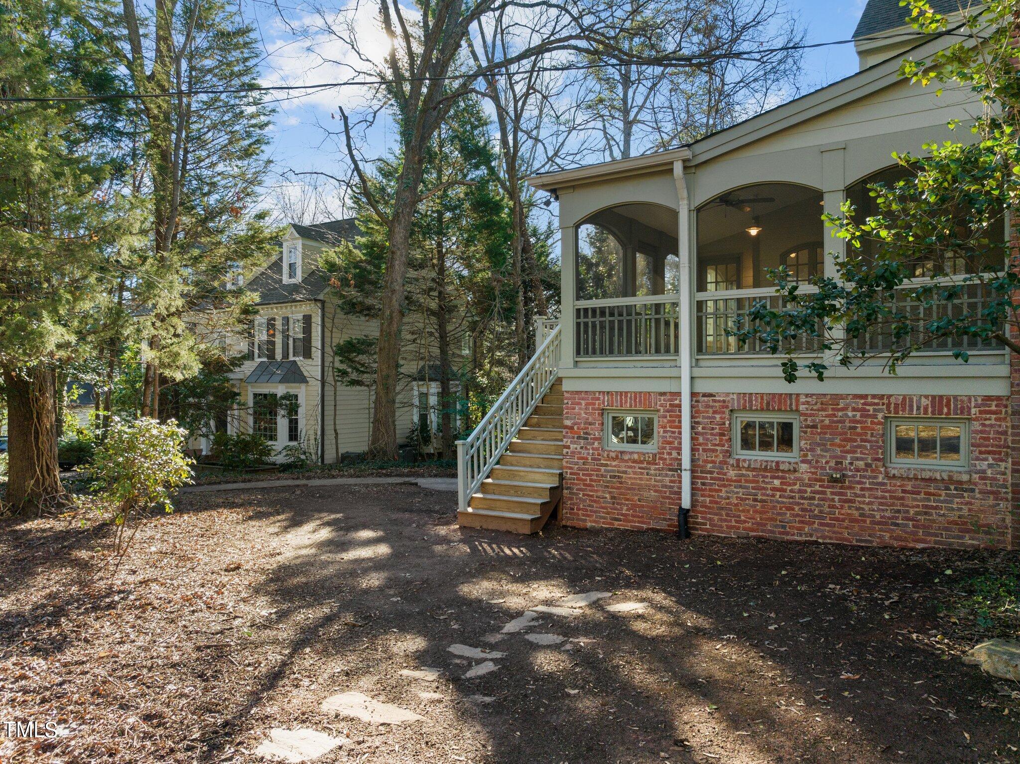228 Furches Street Raleigh, NC 27607 - Photo 53 of 65 a view of a house with a yard