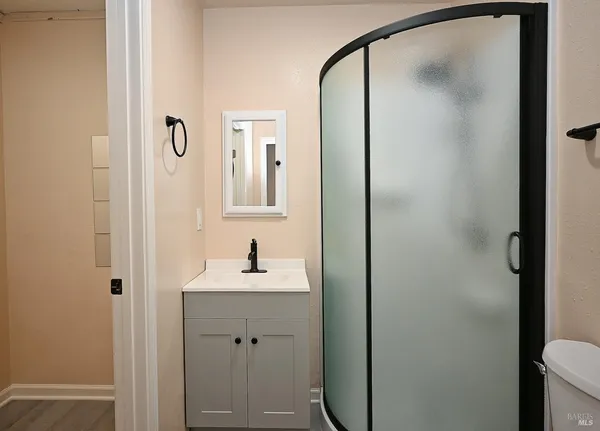 a bathroom with a sink and mirror