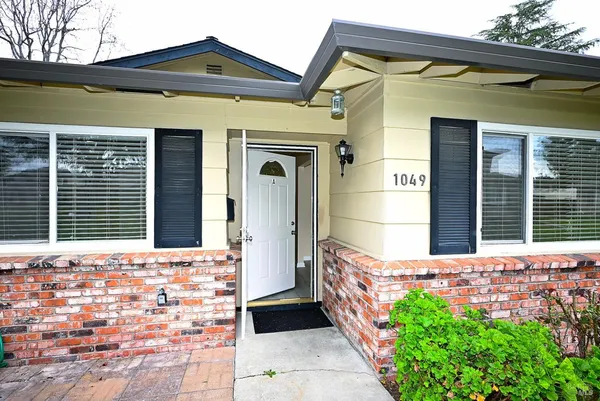 a front view of a house with a garage