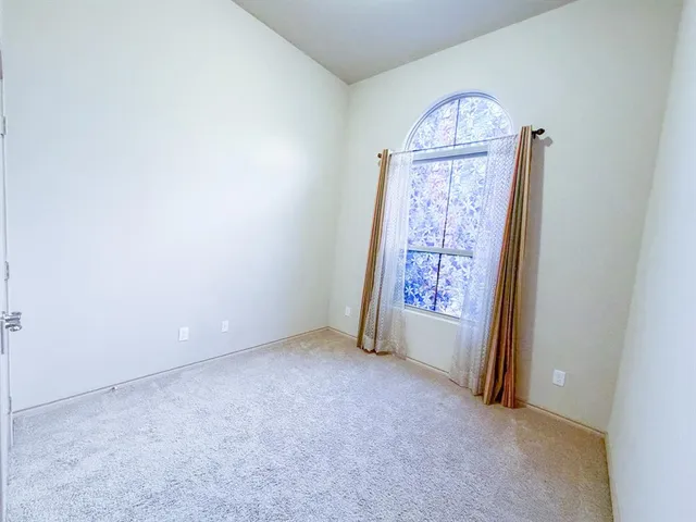 an empty room with window