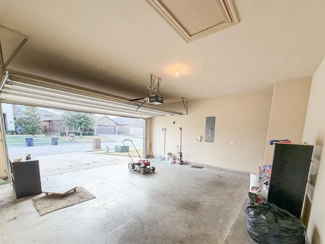 a view of a room with workspace and windows