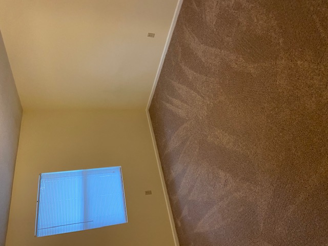 205 Kirk Lane, Unit 6 Pendleton, SC 29670 - Photo 4 of 7 This interior offers a spacious feeling with high ceilings and cozy carpeting.