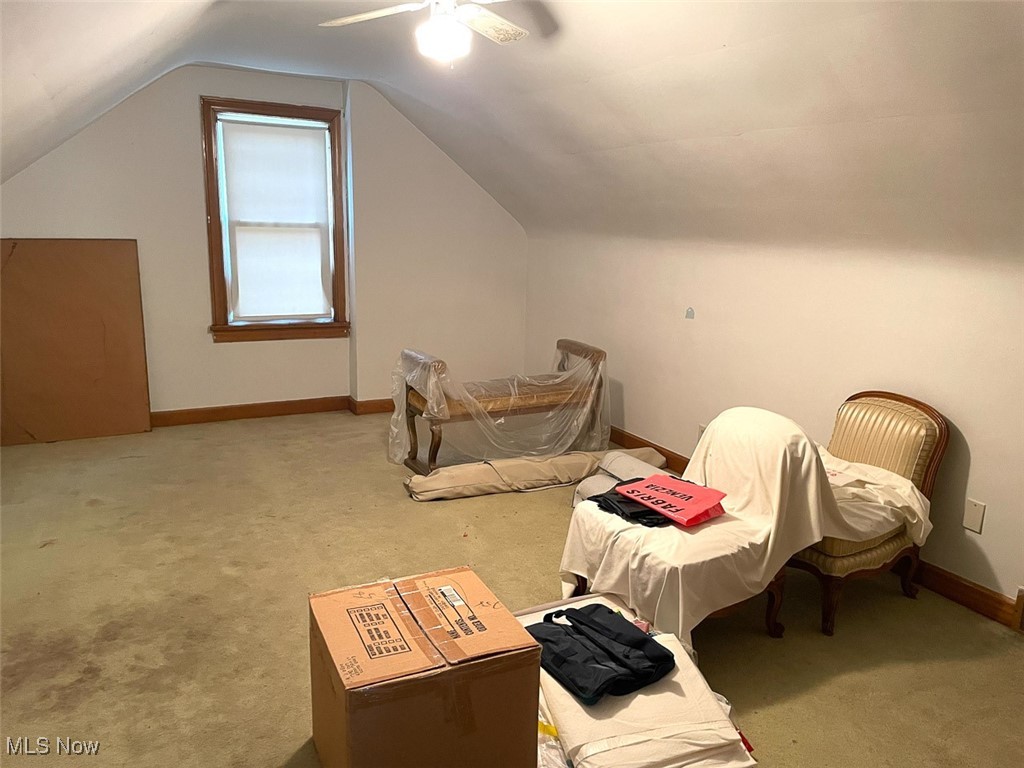 4425 2nd Street Northwest Canton, OH 44708 - Photo 18 of 24 Bedroom with lofted ceiling, carpet flooring, and a ceiling fan