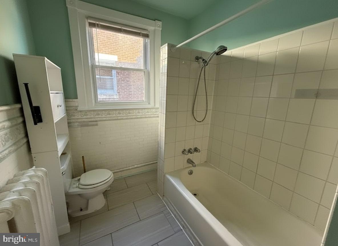 605 West Olney Avenue, Unit 2 Philadelphia, PA 19120 - Photo 11 of 11 a bathroom with a toilet and a bathtub