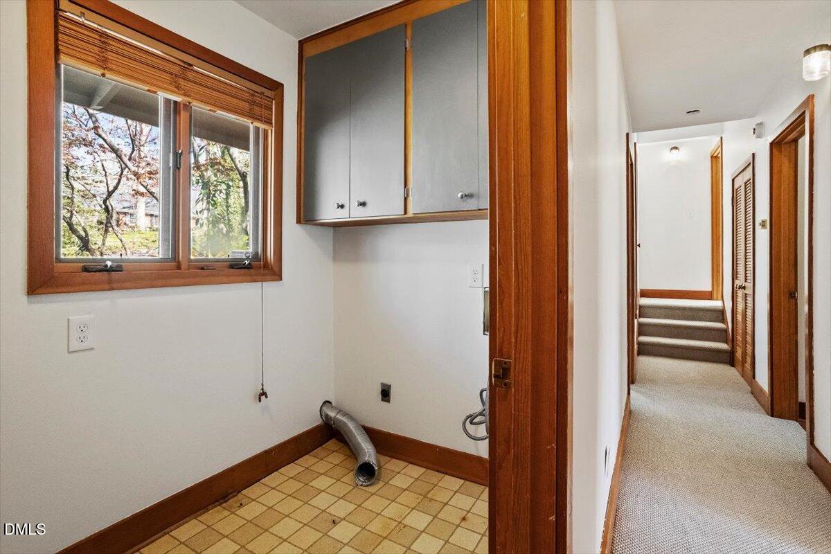 4805 Rembert Drive Raleigh, NC 27612 - Photo 17 of 45 a view of an empty room with a window