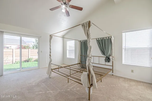 a room that has a bed and a window