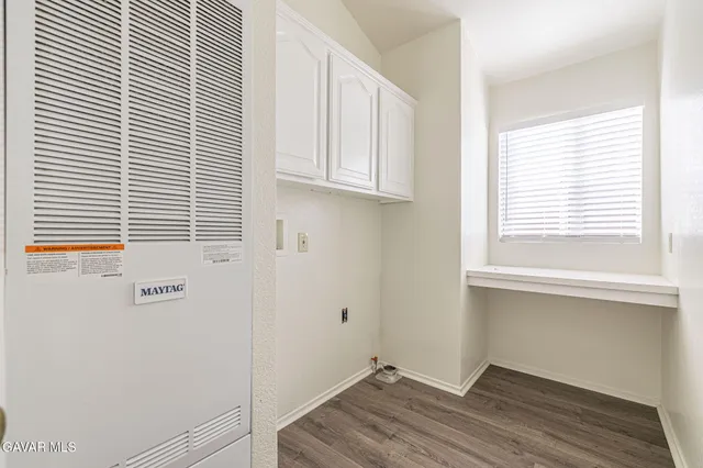 a view of a room that has a window in it