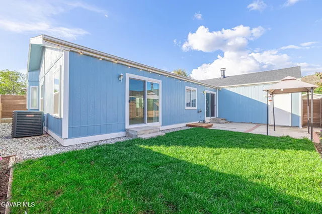 a view of backyard with hardwood
