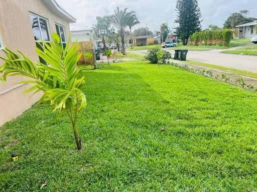 2844 Southwest 3rd Court, Unit 1 Fort Lauderdale, FL 33312 - Photo 6 of 6 a view of a garden with a fountain