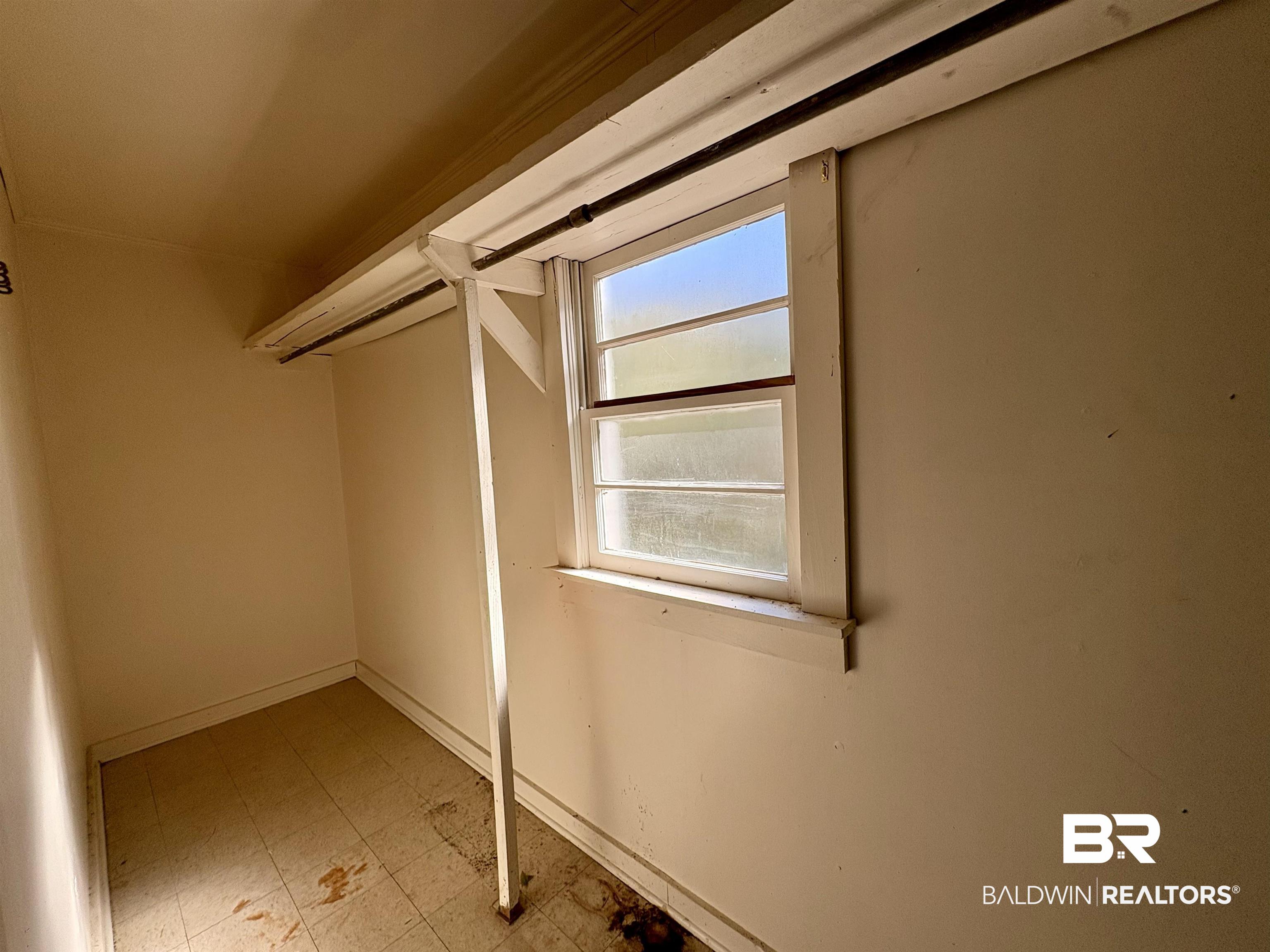 4060 Dickson Lane Mobile, AL 36618 - Photo 11 of 16 Walk in closet featuring light flooring