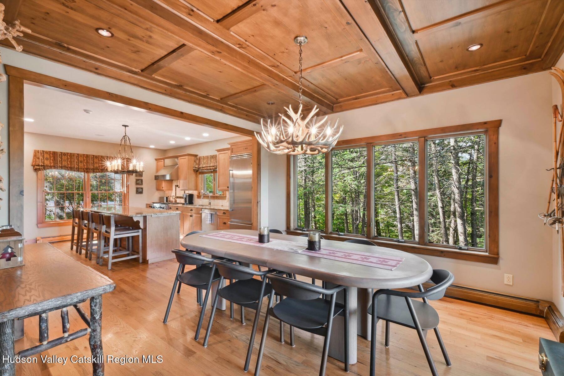 19 Twin Maples Lane Windham, NY 12496 - Photo 20 of 109 a view of a dining room with furniture window and outside view