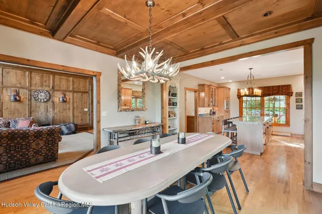 a bedroom with a bed and flat screen tv