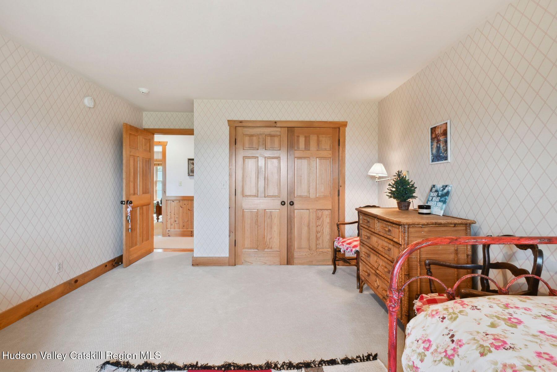 19 Twin Maples Lane Windham, NY 12496 - Photo 45 of 109 a bed room with a bed and a dresser