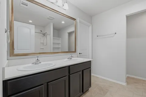 a bathroom with a bath tub and a shower