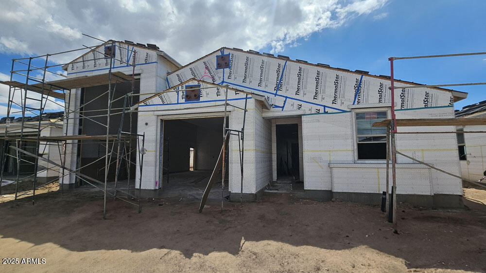2639 Rustler Road San Tan Valley, AZ 85140 - Photo 2 of 29 a view of a house with a porch