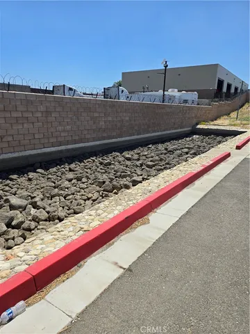 a view of a street with an ocean view