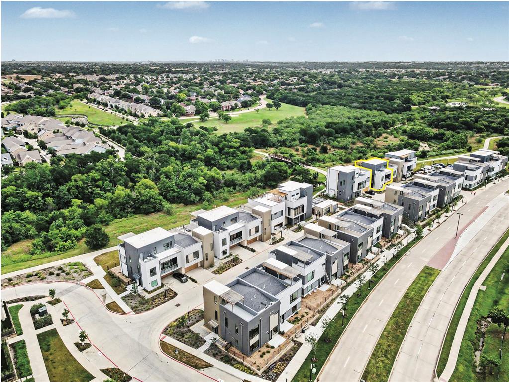1111 Raiford Road, Unit 128 Carrollton, TX 75007 - Photo 7 of 18 Modern residential community that sits next to the Blue Trail. Each unit enjoys a rooftop terrace. (construction photos - professional photos upon completion)