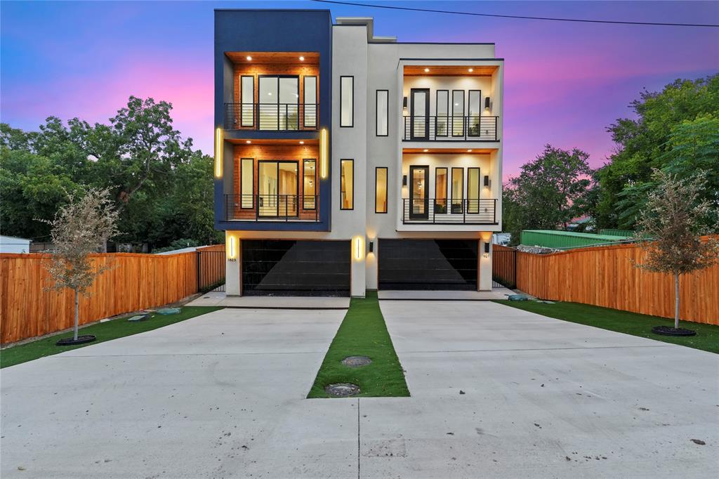 1823 Pollard Street Dallas, TX 75208 - Photo 1 of 28 Contemporary house with stucco siding, driveway, a garage, and a balcony
