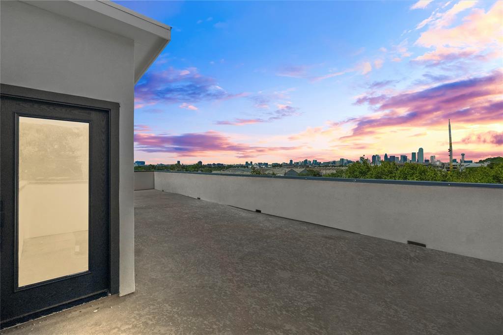 1823 Pollard Street Dallas, TX 75208 - Photo 26 of 28 Patio terrace at dusk featuring a view of skyline