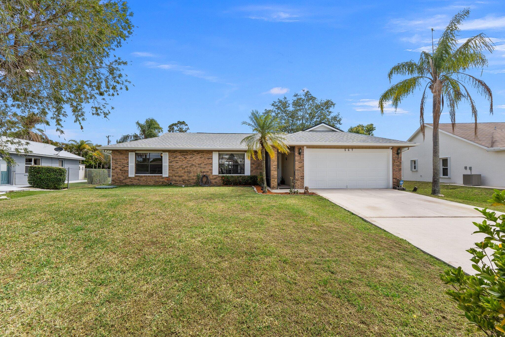 547 Southeast Cliff Road Port St. Lucie, FL 34984 - Photo 1 of 33 Front