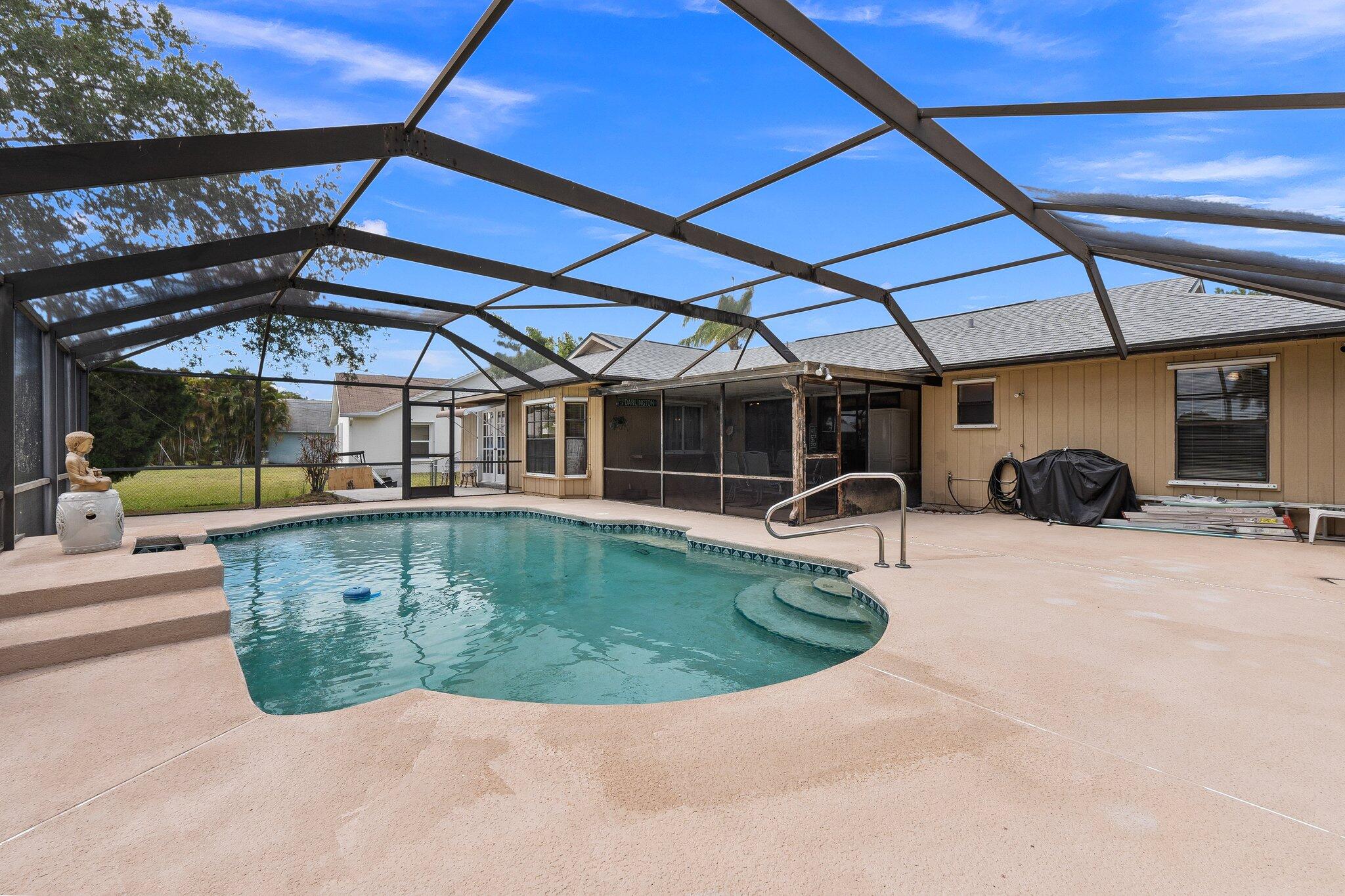 547 Southeast Cliff Road Port St. Lucie, FL 34984 - Photo 12 of 33 Pool View to patio