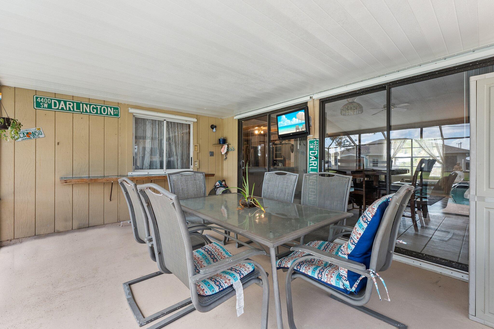 547 Southeast Cliff Road Port St. Lucie, FL 34984 - Photo 14 of 33 Covered Patio/ Pass through window