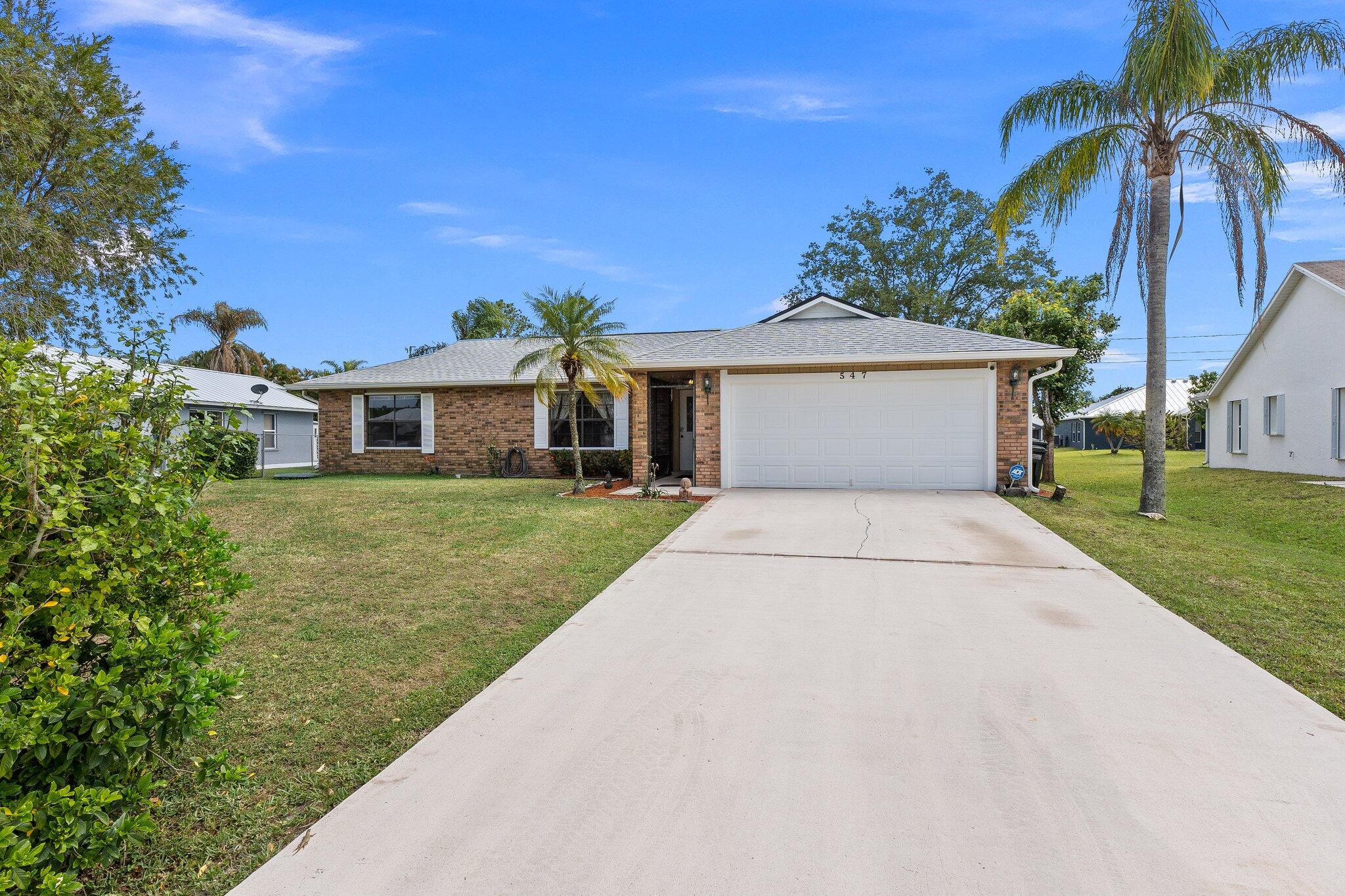 547 Southeast Cliff Road Port St. Lucie, FL 34984 - Photo 2 of 33 Front