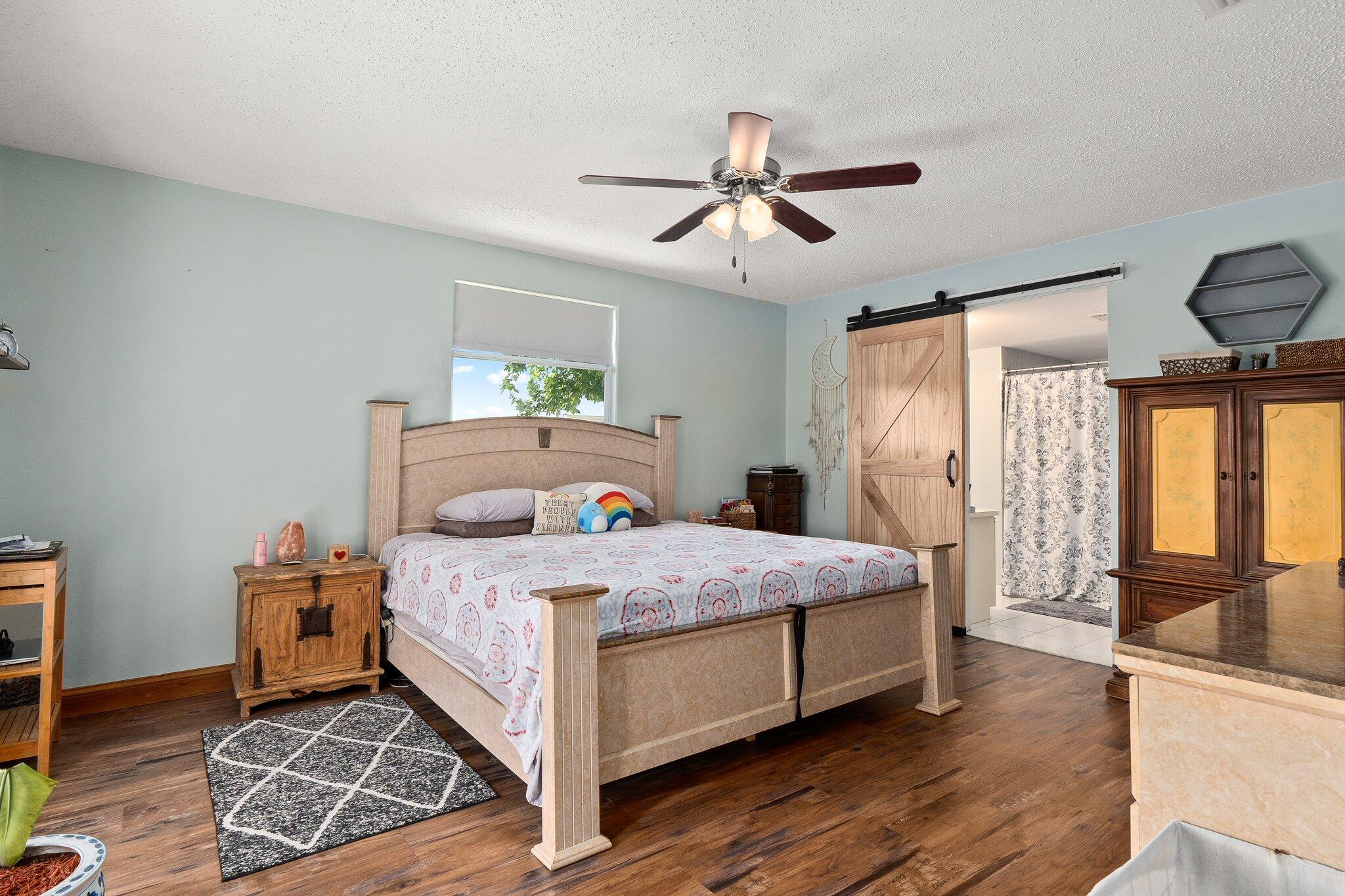 547 Southeast Cliff Road Port St. Lucie, FL 34984 - Photo 33 of 33 Primary bedroom
