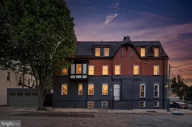 a front view of a building with street view