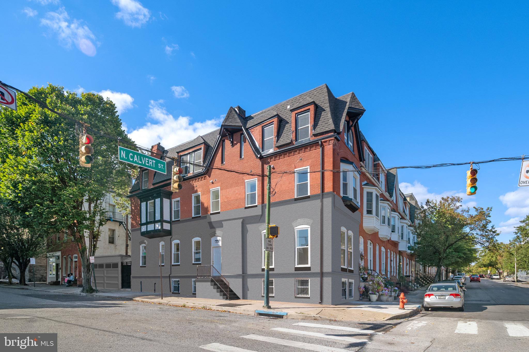 118 East 24th Street, Unit 3 Baltimore, MD 21218 - Photo 14 of 17 a front view of a building with street view