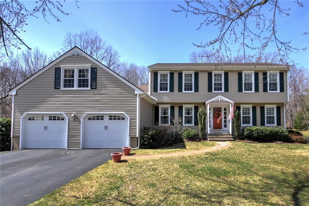 27 Stable Ridge Road Monroe, CT 06468 - Photo 1 of 1 a front view of a house with a yard and garage
