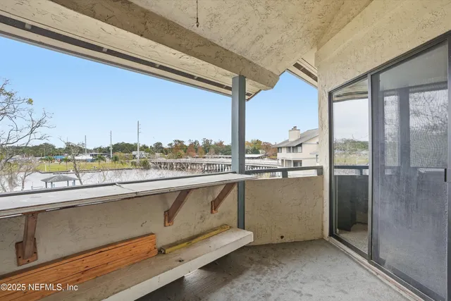 a room with a table and chairs