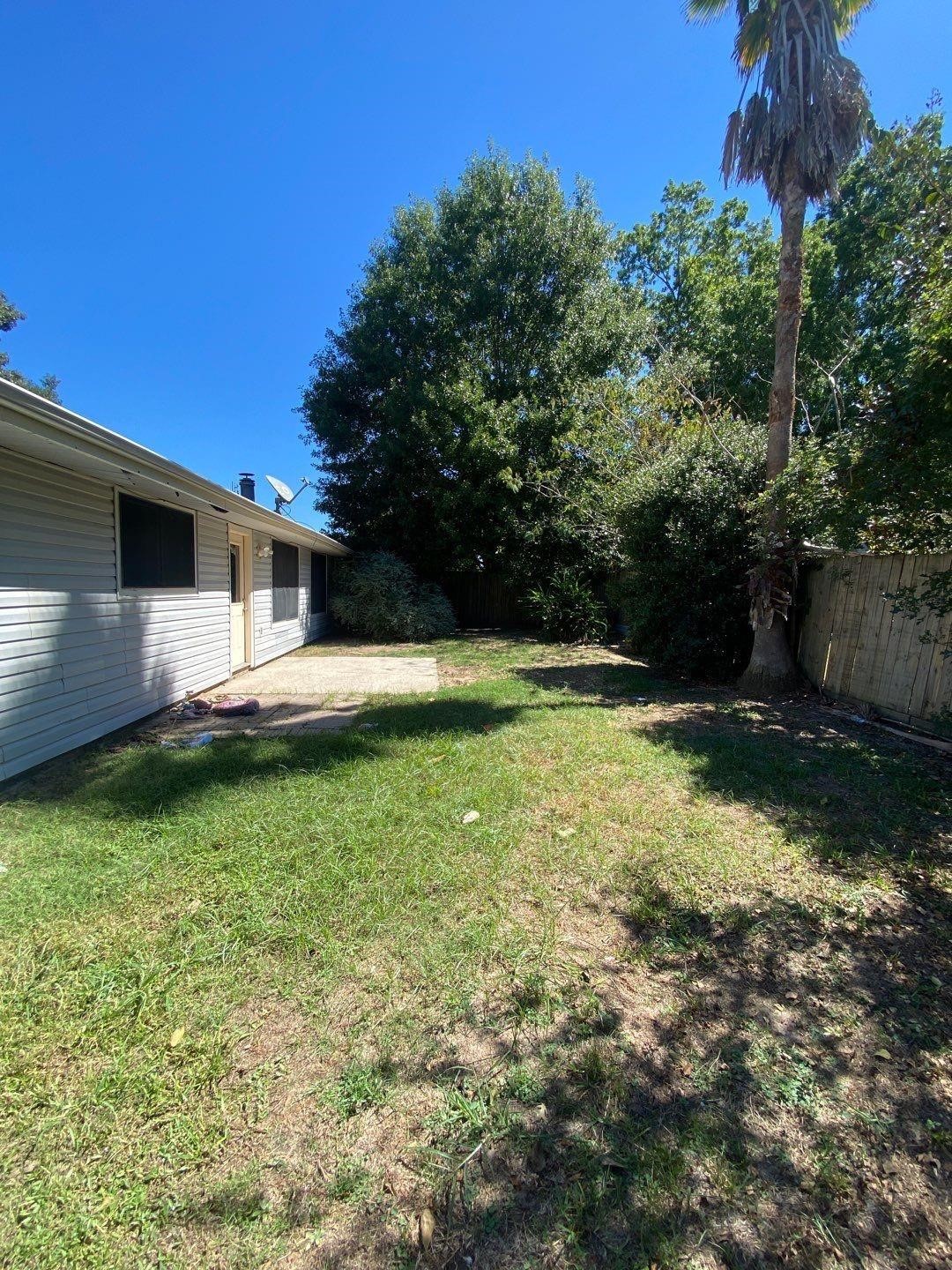 6406 Brookgate Drive Spring, TX 77373 - Photo 24 of 28 a view of a backyard