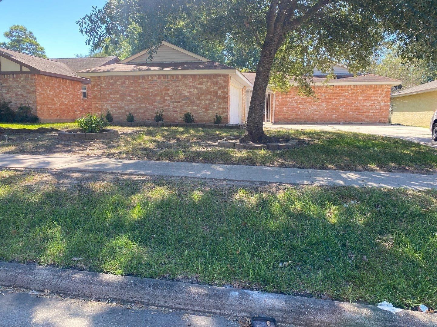 6406 Brookgate Drive Spring, TX 77373 - Photo 26 of 28 a backyard of a house with lots of green space