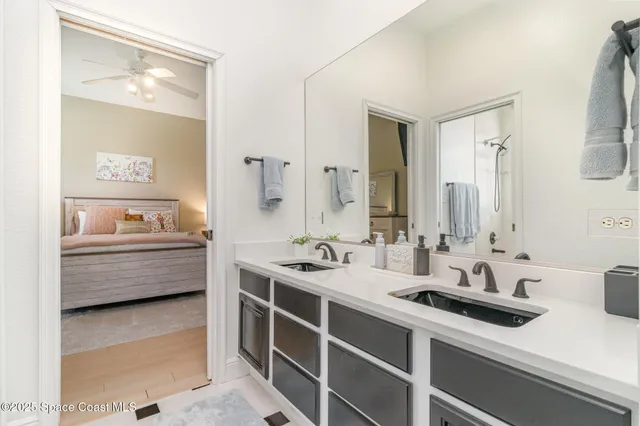 a front view of house with yard and trees