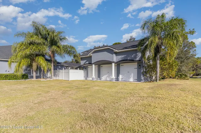 a view of a livingroom with furniture and wooden floor