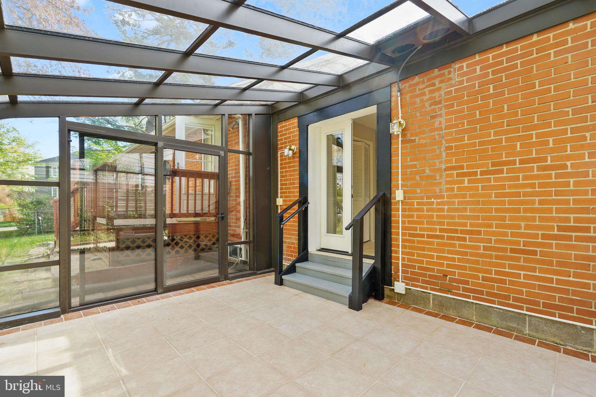7421 Nigh Road Falls Church, VA 22043 - Photo 29 of 32 Sunroom Patio