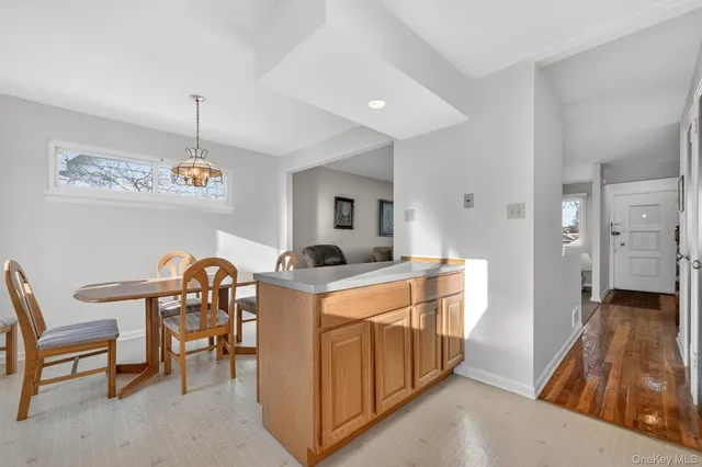 a kitchen that has a lot of cabinets in it