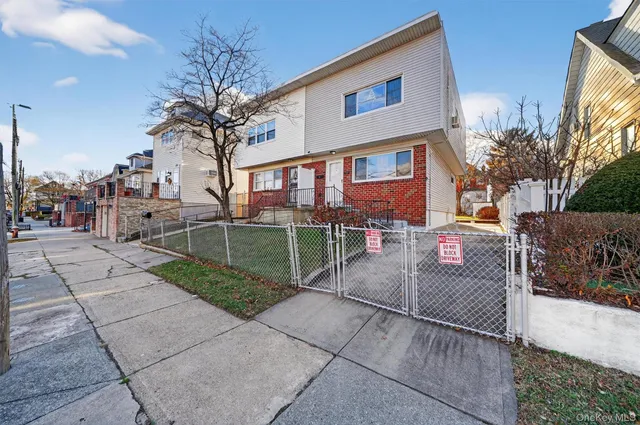 a view of a backyard with sitting area