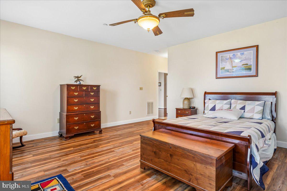 12195 Potomac View Road Newburg, MD 20664 - Photo 20 of 91 a bedroom with a bed and a dresser