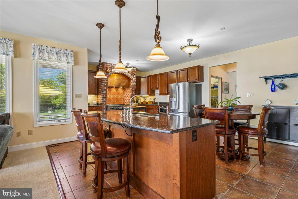 12195 Potomac View Road Newburg, MD 20664 - Photo 29 of 91 a view of a dining room with furniture window and outside view