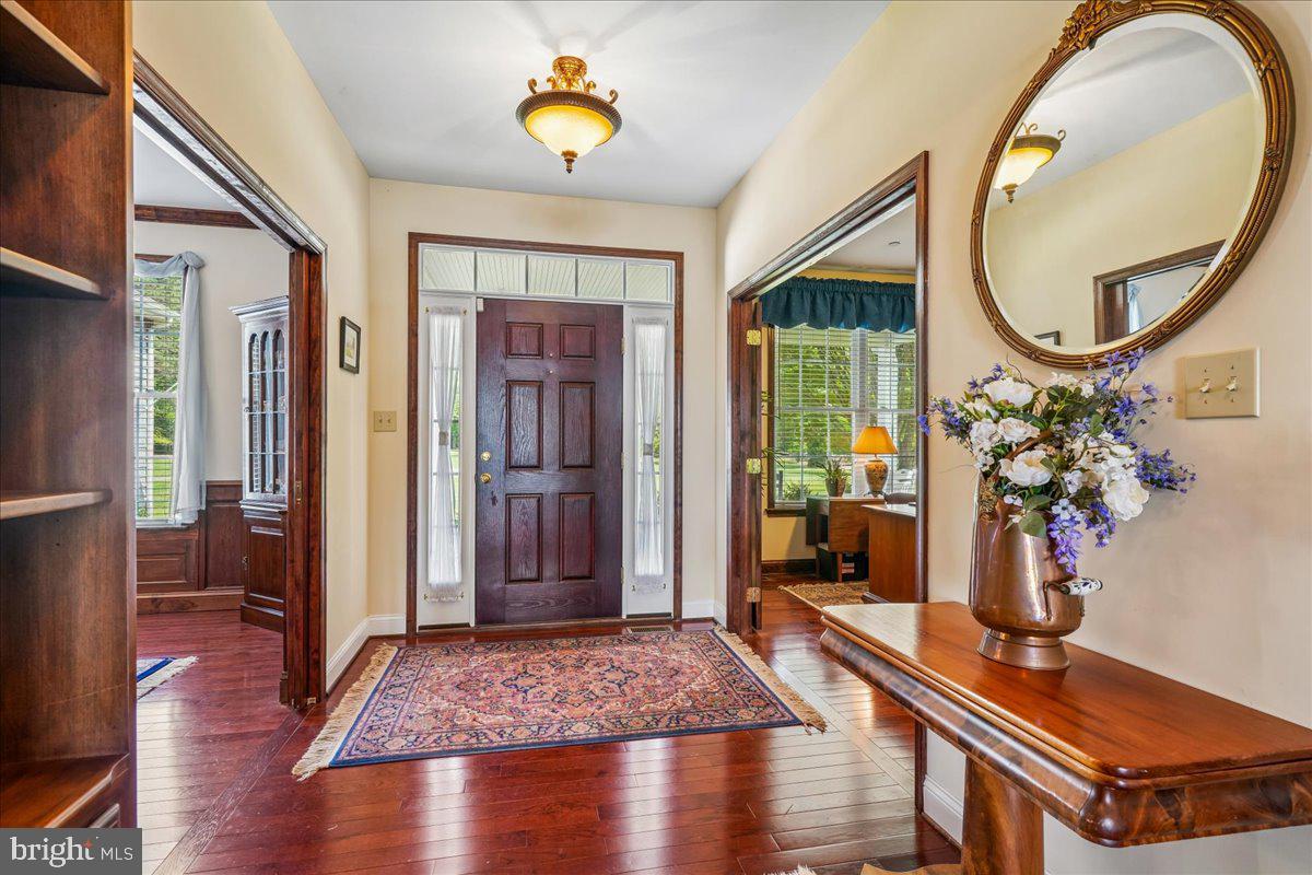 12195 Potomac View Road Newburg, MD 20664 - Photo 6 of 91 a living room with furniture and a wooden floor