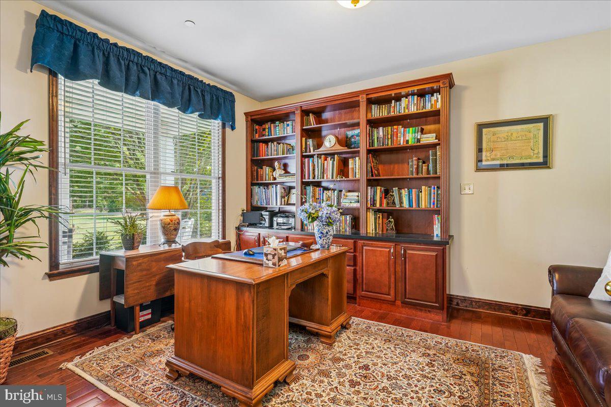 12195 Potomac View Road Newburg, MD 20664 - Photo 8 of 91 a view of a workspace with furniture and a window