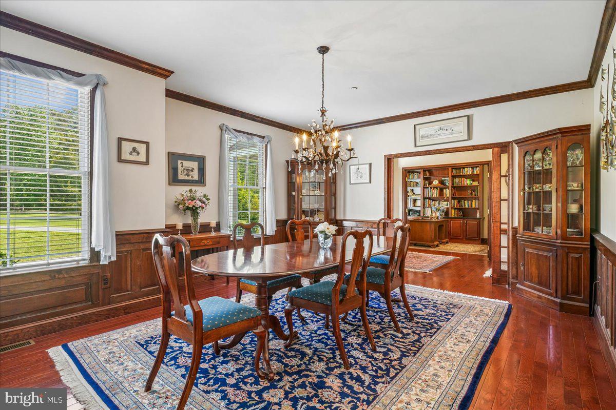 12195 Potomac View Road Newburg, MD 20664 - Photo 10 of 91 a view of a dining room with furniture window and wooden floor
